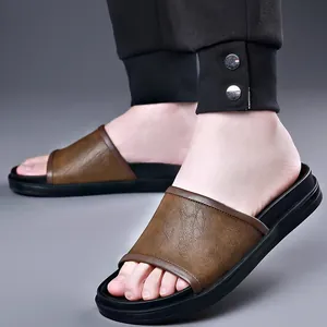 Stylish brown leather men's casual summer slippers with thick black sole for outdoor beach wear