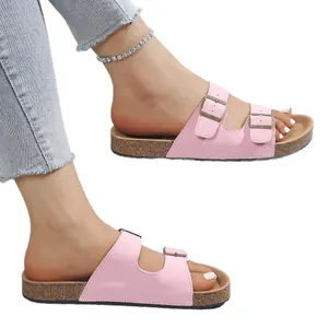 Stylish pink platform buckle sandals with comfortable cork footbed for casual beach wear