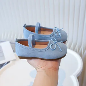 Elegant blue suede Mary Jane shoes for girls with cute bow detail and soft sole