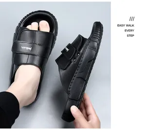Black leather men's slides featuring comfortable thick sole and adjustable strap