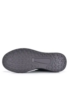 Gedetailleerd beeld van de duurzame honingraat buitenzool van de ademende heren sneakers