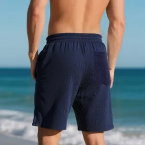 Back view of men's navy blue shorts showing unique geometric jacquard fabric texture