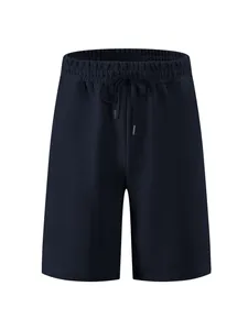 Detailed view of men's navy shorts featuring a heavy jacquard geometric texture pattern