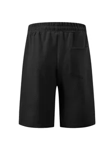 Back view of black men's shorts featuring detailed jacquard texture and rear pocket detail