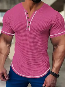 Detailed view of pink men's slim-fit muscle Henley shirt with seersucker textured fabric