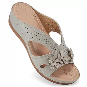 Stylish grey wedge heel sandals with elegant hollow-out design and floral decorations