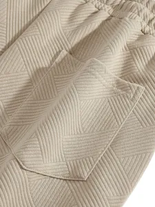 Macro view showing the premium jacquard texture and pocket detail of men's shorts