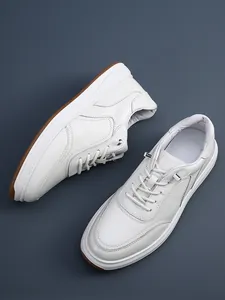 Premium men's white head layer cowhide sneakers with breathable texture and elastic laces.
