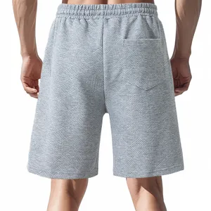 Macro view of the back pocket and heavy jacquard texture on these casual gray men shorts