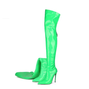 Neon green patent leather thigh-high boots with a pointed toe and stiletto heel.