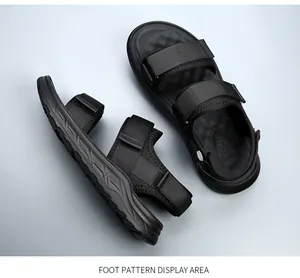 Macro view of non-slip rubber sole and adjustable straps on black men's sandals