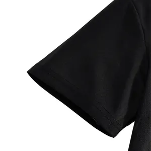 Close-up of black breathable pique fabric on men's short sleeve polo shirt