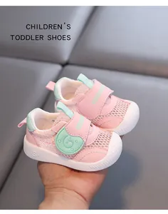 Close-up of pink breathable mesh toddler shoes with soft anti-slip rubber soles.