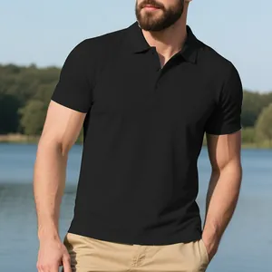 Detail view of a men's black quick-dry polo shirt in a natural outdoor setting