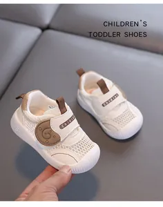 Detail view of breathable white mesh toddler shoes featuring soft non-slip rubber soles