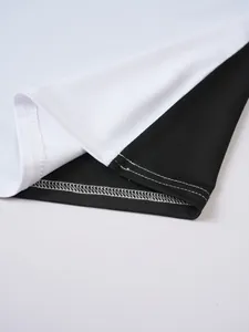 Macro detail of the double-needle hem stitching on a black and white sports tank top