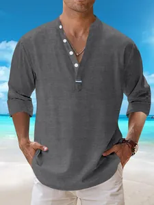 Men's casual grey cotton linen Henley shirt featured in a sunny tropical beach scene
