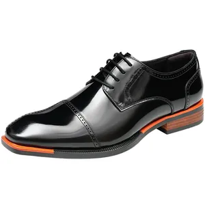 Glossy black leather Derby shoes with stylish orange sole accents