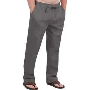 Detail view of men's dark grey linen pants with drawstring elastic waist and side pockets.