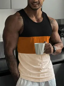 Close-up of men's slim fit color-block fitness tank top in black, orange, and beige