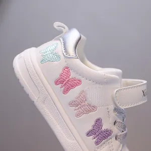 Toddler girls white walking shoes featuring vibrant butterfly embroidery details