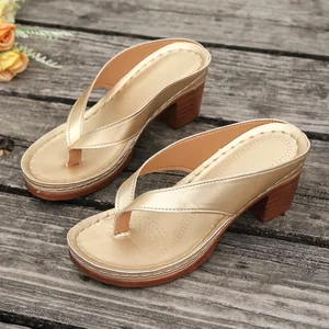 Elegant gold block heel thong sandals for women featuring a stylish summer beach design