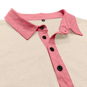 Detailaufnahme eines atmungsaktiven Herren-Henley-T-Shirts mit rosa Kontrastkragen