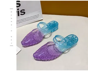 Elegant glitter crystal jelly sandals with purple and blue gradient for summer wear.