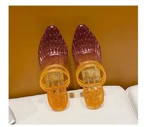Gradient glitter jelly sandals with pointed toe and wedge heel design