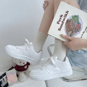 Classic white platform sneakers for women featuring a minimalist and versatile spring design