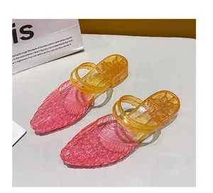 Stylish gradient pink and yellow glitter jelly sandals with a comfortable wedge heel
