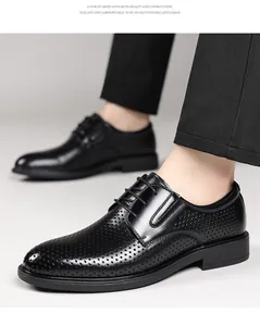 Detailed view of men's perforated black leather business dress shoes for summer comfort