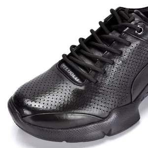 Zapatos casuales de hombre en cuero negro transpirable con elegantes detalles perforados