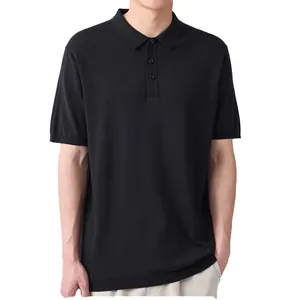 Detailed close-up of a premium black slim-fit polo shirt with breathable fabric