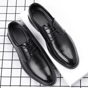 Professional men's black perforated leather business dress shoes for summer office wear.