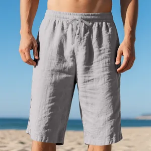 Detailed view of men's grey linen beach shorts featuring a breathable drawstring waist