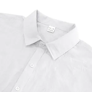 Close-up detail of the collar and material label on a white linen short sleeve shirt