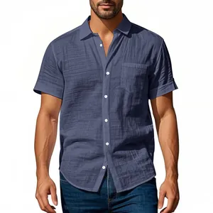 Detailed view of a men's navy blue short sleeve linen shirt with a relaxed fit on a model