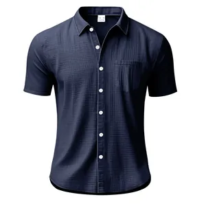 Detail of navy blue linen short sleeve shirt with chest pocket and white buttons