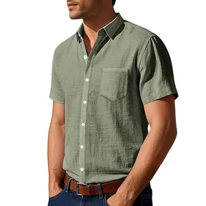 Detail view of men's casual olive green linen short-sleeve shirt with a chest pocket.