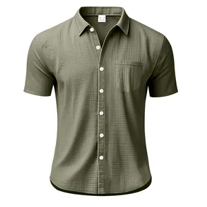 Detailed view of olive green short sleeve linen shirt with chest pocket and texture.