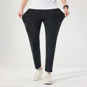 Unisex ijszijde sneldrogende sportbroek met demonstratie van hoge elasticiteit en draagcomfort