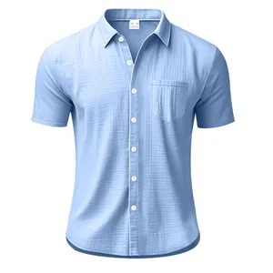 Close-up detail of a light blue short-sleeved cotton linen shirt with pocket for summer