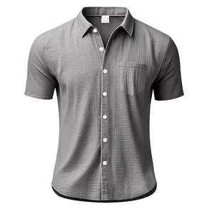 Close-up of gray men's short sleeve linen shirt featuring a front pocket and button details.