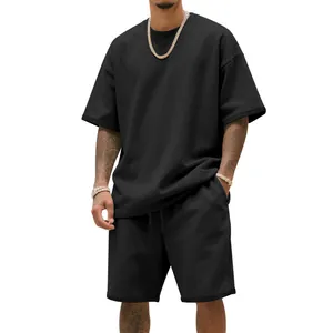 Conjunto de camiseta oversize y pantalones cortos negros de algodón grueso para hombre, estilo.