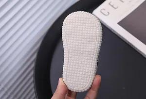 Detailed close-up of the anti-slip soft outsole on baby walking shoes for safety