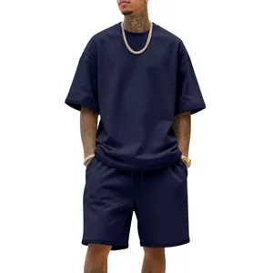 Detail view of men's navy blue oversized street style heavy cotton shorts and t-shirt set.