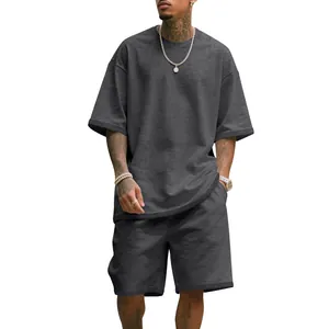 Men's dark gray heavy terry cotton two-piece set featuring oversized tee and shorts.