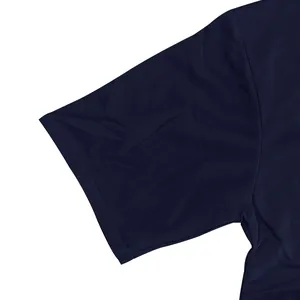 Detailed close-up of navy blue short sleeve cuff showing heavy cotton fabric texture