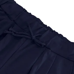 Close-up detail of navy blue heavy loopback shorts with drawstring waistband